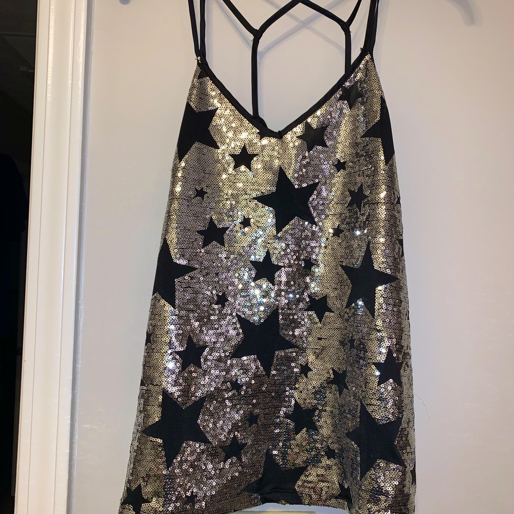 XOXO- sequin racer back tank. The front is lined sequin. Size small.